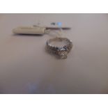 An 18ct White Gold Emerald cut Diamond ring,