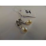 A pair of 18ct White Gold Blue Diamond and Pearl earrings