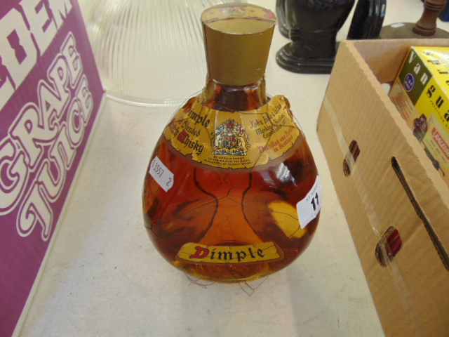 A Vintage bottle of Dimple Scotch