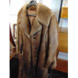 Two fur jackets, a coat and a qty of stoles, inc.