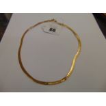 A 9ct gold necklace,a.