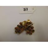 A pair of 18ct Gold Ruby and Sapphire set earrings