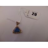 An 18ct Gold Opal and Diamond pendant