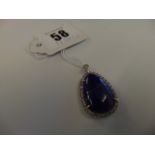 An 18ct Gold hallmarked Diamond and Lapis Lazuli pendant