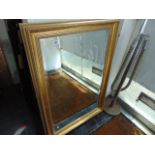 A gilt framed bevelled mirror 100 x 70 cm