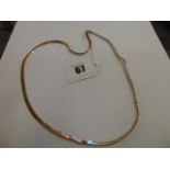 A 9ct Gold tri colour chain,