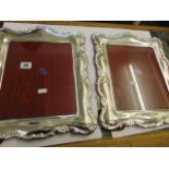 A pair of hall marked Silver photo frames,