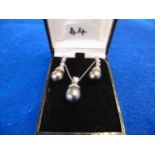 A pair of 18ct White Gold earrings and p