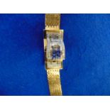 An 18ct Gold Sapphire and Diamond flip-t