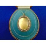 A 15ct Gold and Pearl locket