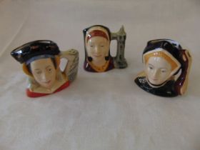 Three Royal Doulton character mini jugs,