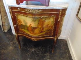 An Ormulu mounted marble top cabinet