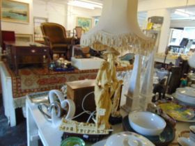 A decorative lamp , figure and boat etc.