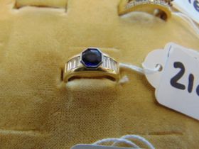 An 18ct Gold Sapphire and Diamond ring with Platinum Colette