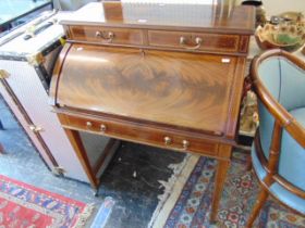 A inlaid Mahogany cylinder bureau