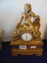 A brass mantle clock