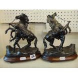 A pair of small Horse statues