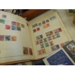 A small stamp album and a book