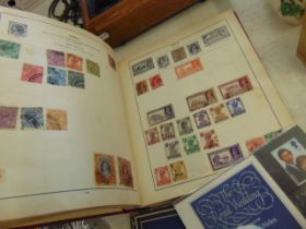 A small stamp album and a book