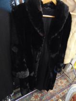 A black fur coat