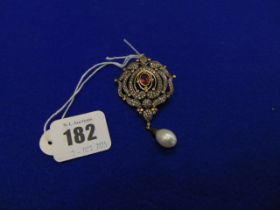A Diamond and Pearl gem set pendant