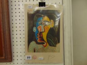 A Picasso gallery print, face of a woman,