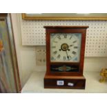 A Mahogany US cased alarm clock