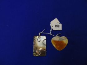 Two large Silver mounted mother of pearl pendants