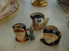 Three Royal Doulton character mini jugs,