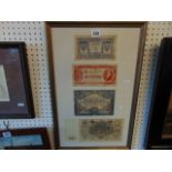 A framed set bank notes