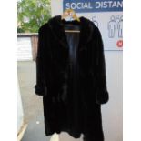 A black fur coat
