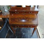 A inlaid Mahogany cylinder bureau