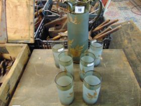 A Bohemian overlay jug and six matching tall glasses, good condition,