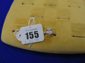 An 18ct White Gold Diamond ring, centre stone cushion cut, 2 1/2 carats,
