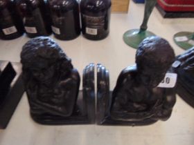 A pair of bronze and marble bookends