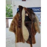A Mink stole and other furs collars
