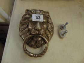 A Lion door knocker and part