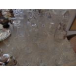 A large qty of glassware inc, decanters, vases etc.