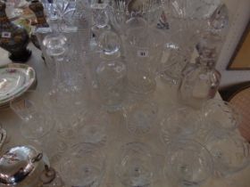 A large qty of glassware inc, decanters, vases etc.