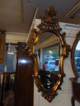 A gilt framed mirror