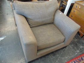 An upholstered armchair