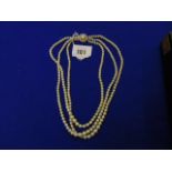 A three row Pearl necklace on 9ct GOld clasp