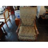 A 19th century upholstered armchair