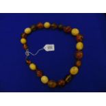 An Amber large beaded necklace,