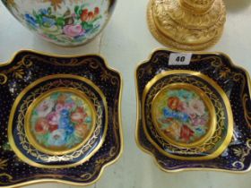 A good quality pair of Limoges Ormulu mounted dishes