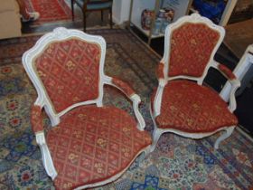 A pair of French salon style chairs