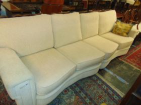 A cream four seater sofa
