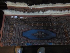 A pair of decorative rugs