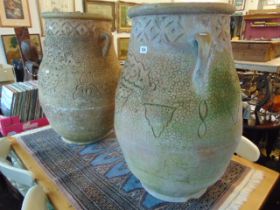 A pair of Terracotta urns