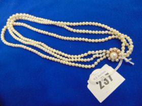 A three row Pearl necklace on 9ct GOld clasp